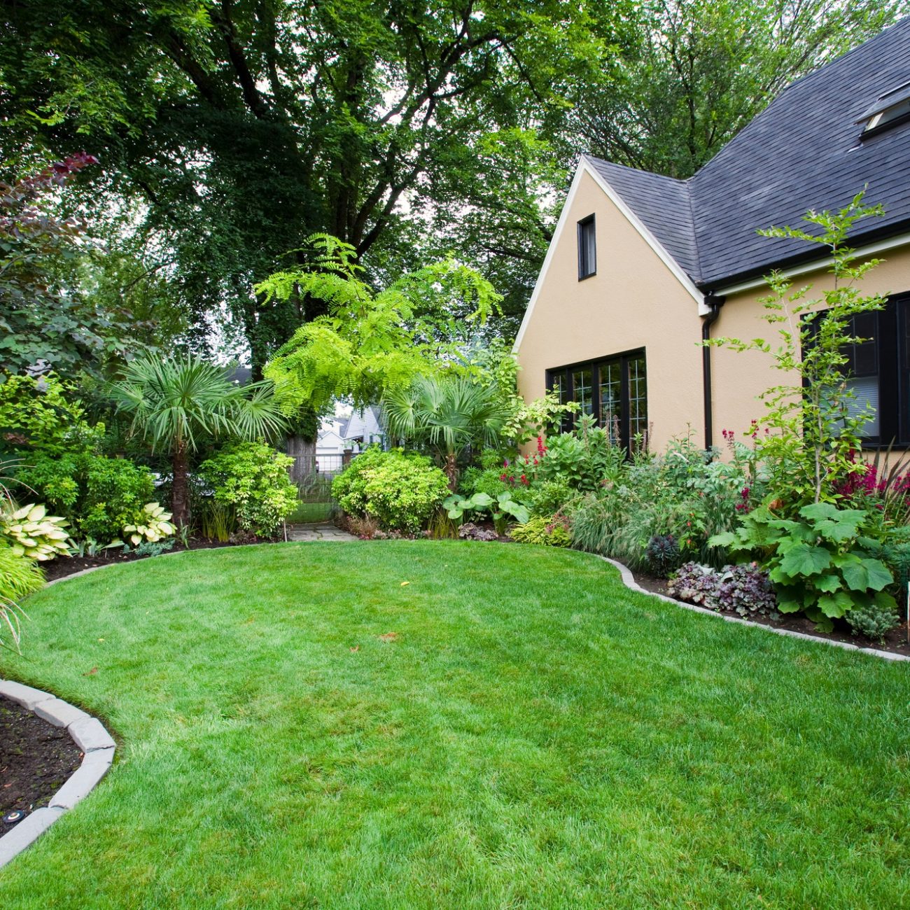 House and Landscaped Yard